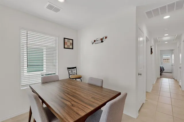a view of a livingroom with furniture and window
