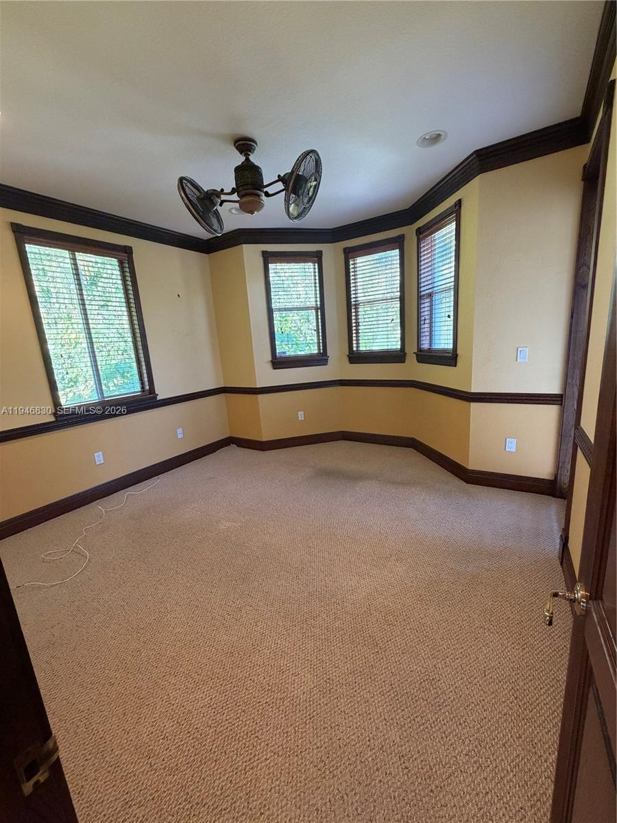 6601 Southwest 166th Court Miami, FL 33193 - Photo 19 of 28 a view of an empty room with a window