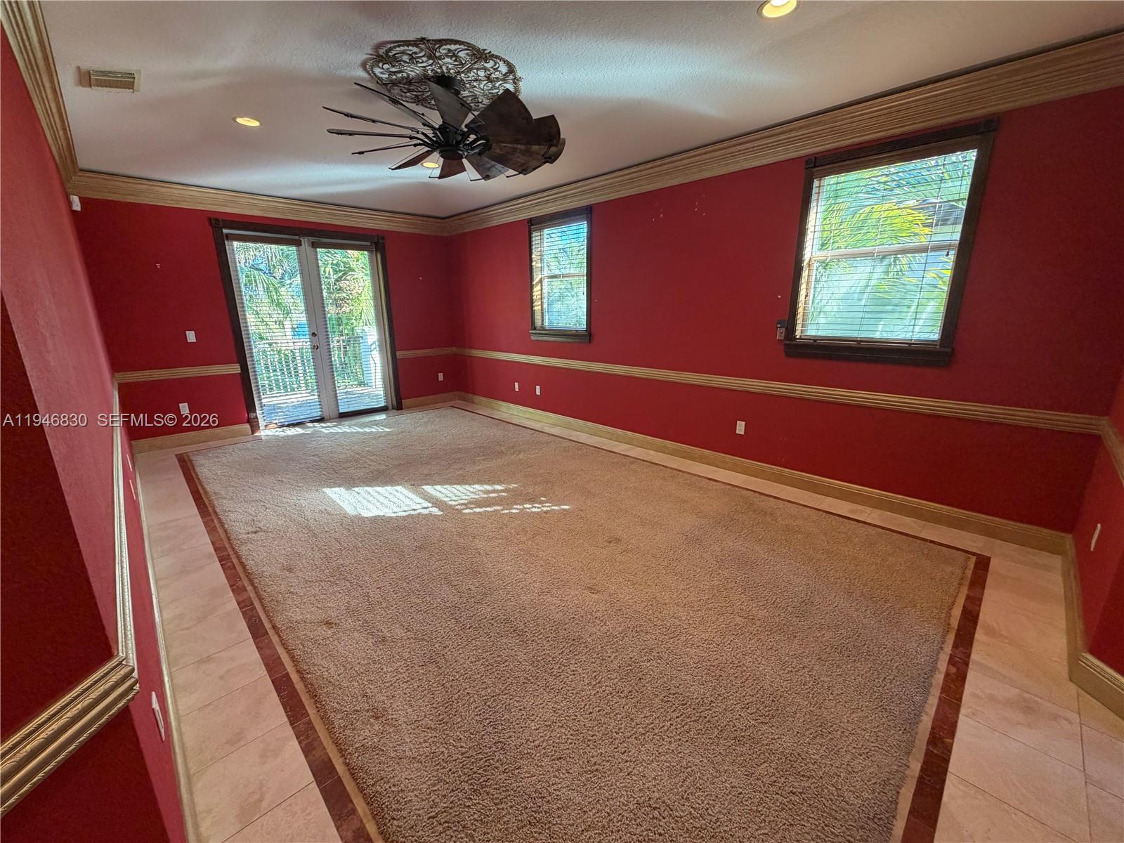 6601 Southwest 166th Court Miami, FL 33193 - Photo 21 of 28 a view of an empty room and window
