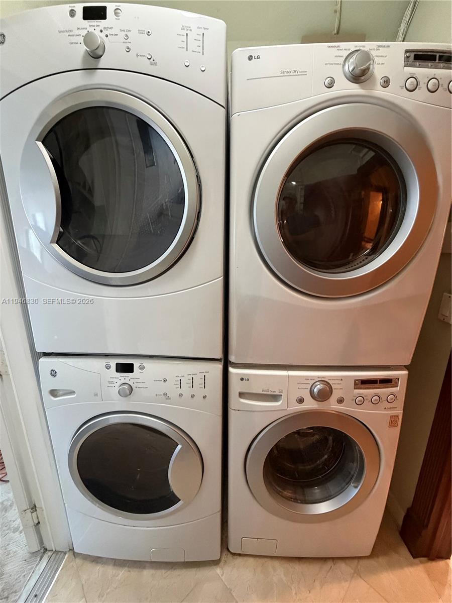 6601 Southwest 166th Court Miami, FL 33193 - Photo 26 of 28 a utility room with dryer and washer