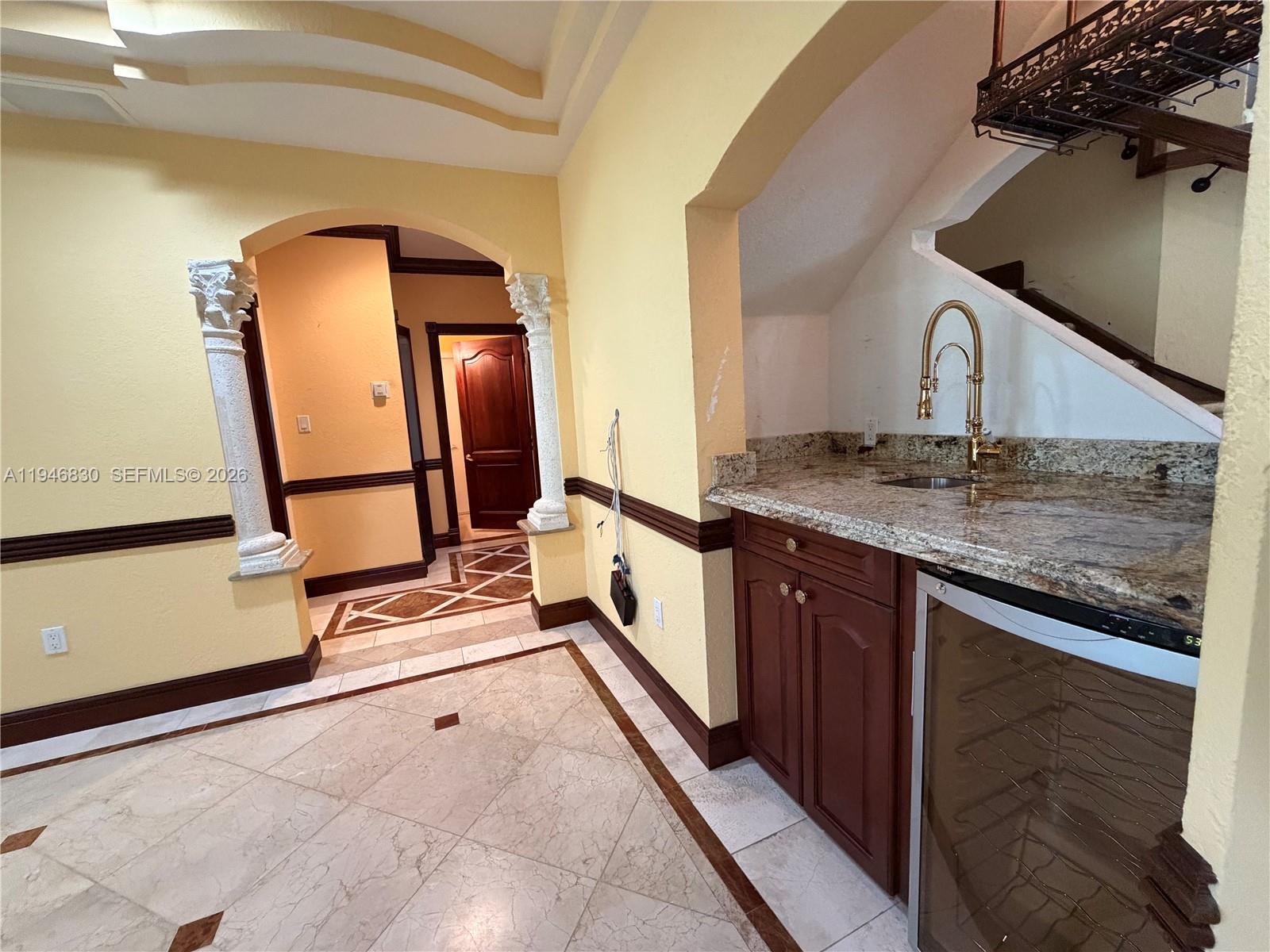 6601 Southwest 166th Court Miami, FL 33193 - Photo 8 of 28 a bathroom with a sink and mirror