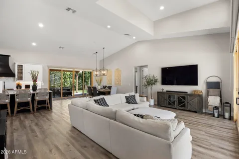 a living room with furniture or couch and a flat screen tv