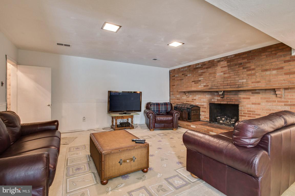 12314 Purcell Road Manassas, VA 20112 - Photo 23 of 35 Beautiful brick fireplace with gas insert
