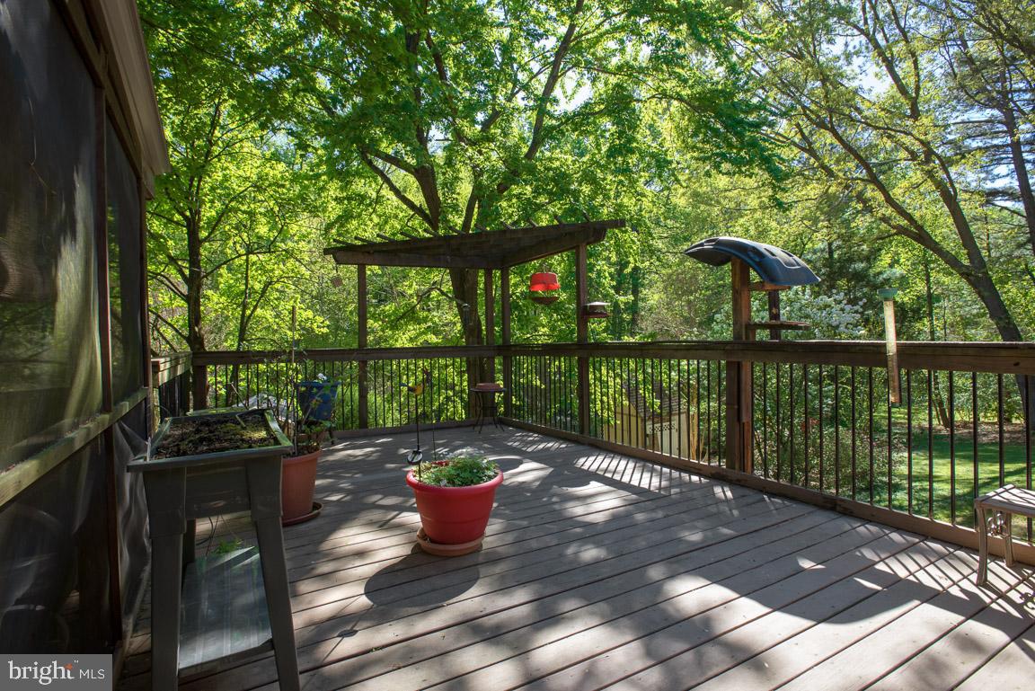 12314 Purcell Road Manassas, VA 20112 - Photo 29 of 35 Shaded deck overlooking backyard