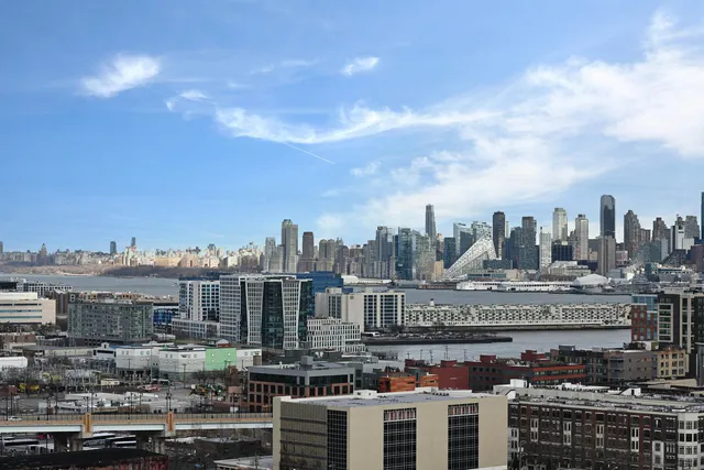 a view of a city with tall buildings