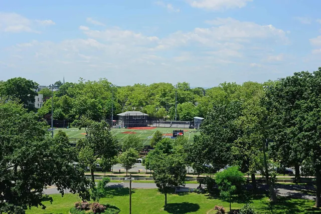 a view of a city with tall buildings