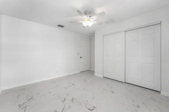 a view of a livingroom with a flat screen tv