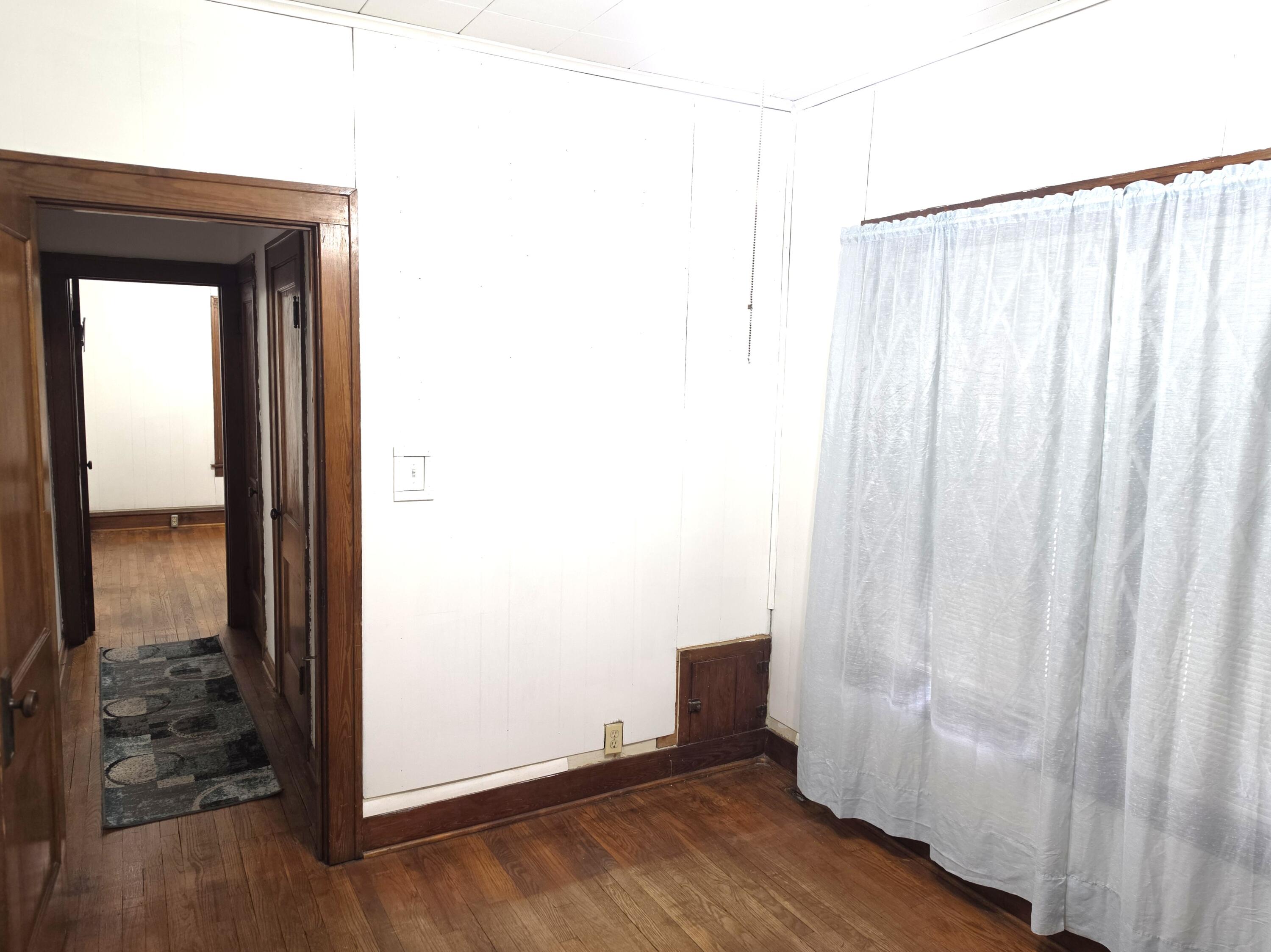 1173 Tyler Street Gary, IN 46407 - Photo 22 of 36 a view of a room with wooden floor