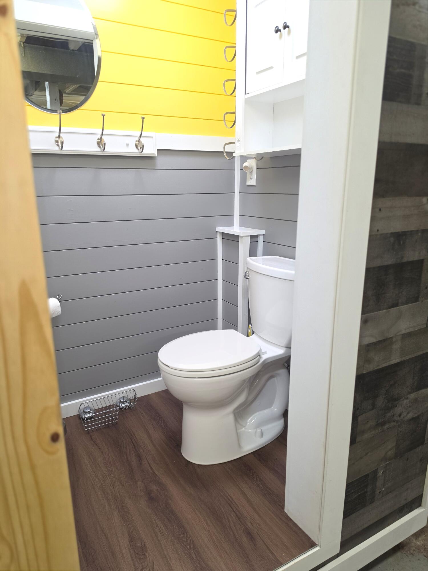 1173 Tyler Street Gary, IN 46407 - Photo 26 of 36 a bathroom with a toilet and a sink