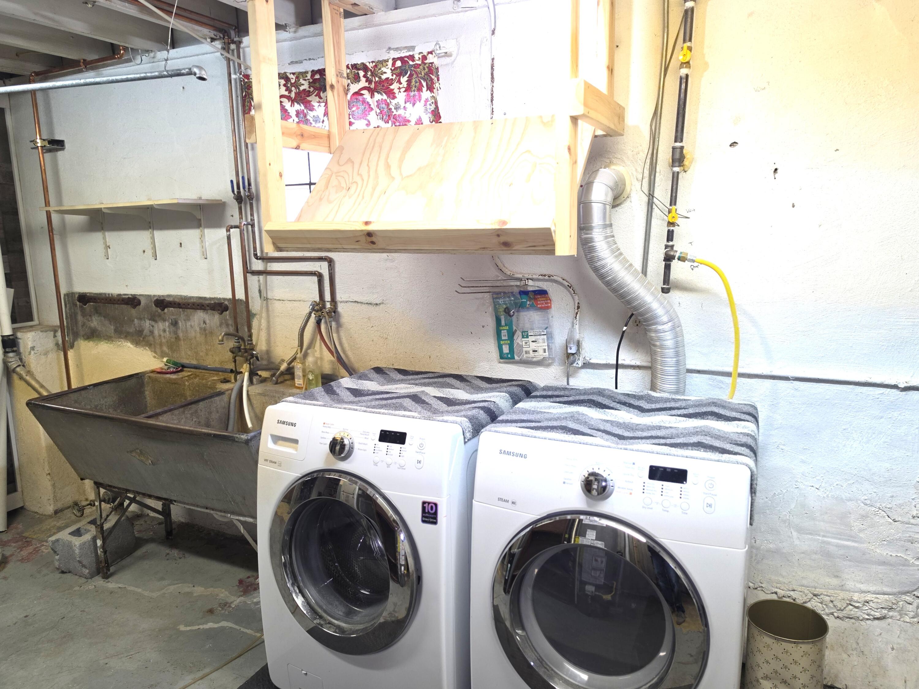 1173 Tyler Street Gary, IN 46407 - Photo 27 of 36 a utility room with dryer and washer