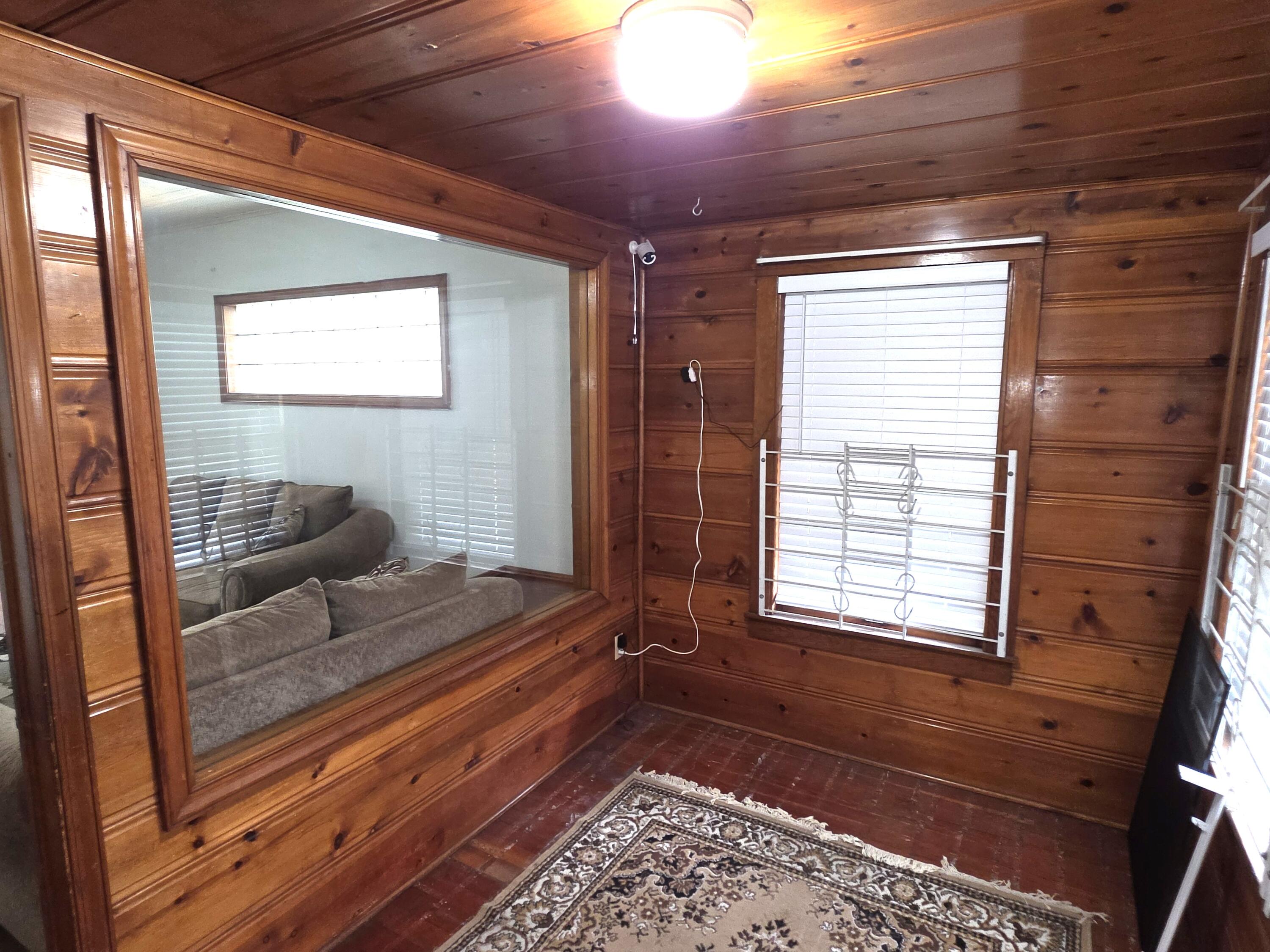 1173 Tyler Street Gary, IN 46407 - Photo 5 of 36 a living room with furniture and a window