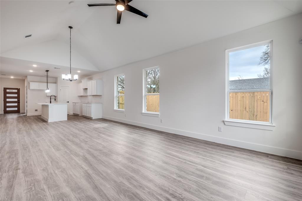 4812 Fellows Lane Dallas, TX 75216 - Photo 10 of 25 a view of a kitchen and a kitchen counter tops with wooden floors