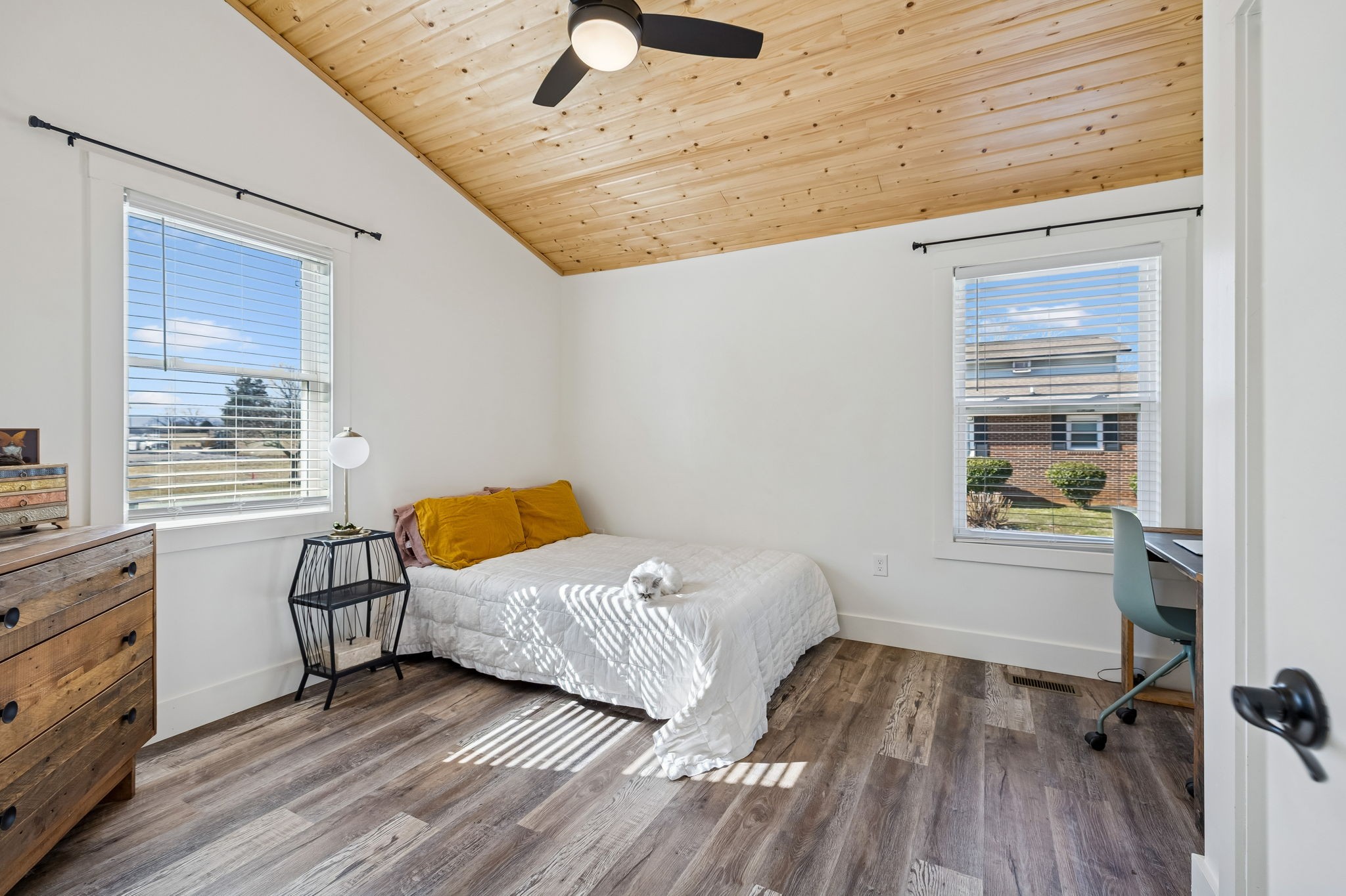 516 Davis Street Cowan, TN 37318 - Photo 15 of 40 a bedroom with a bed and a window