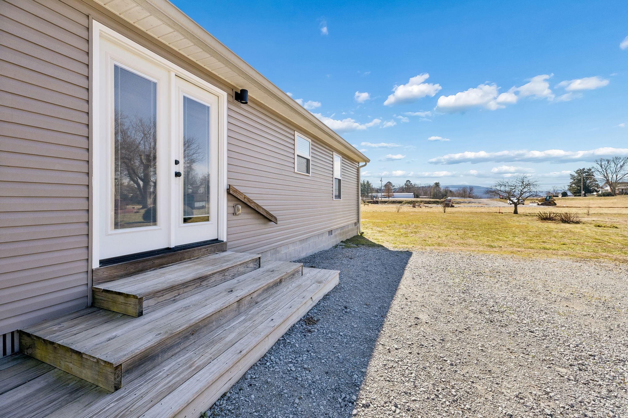 516 Davis Street Cowan, TN 37318 - Photo 2 of 40 a view of a house with swimming pool and sitting area
