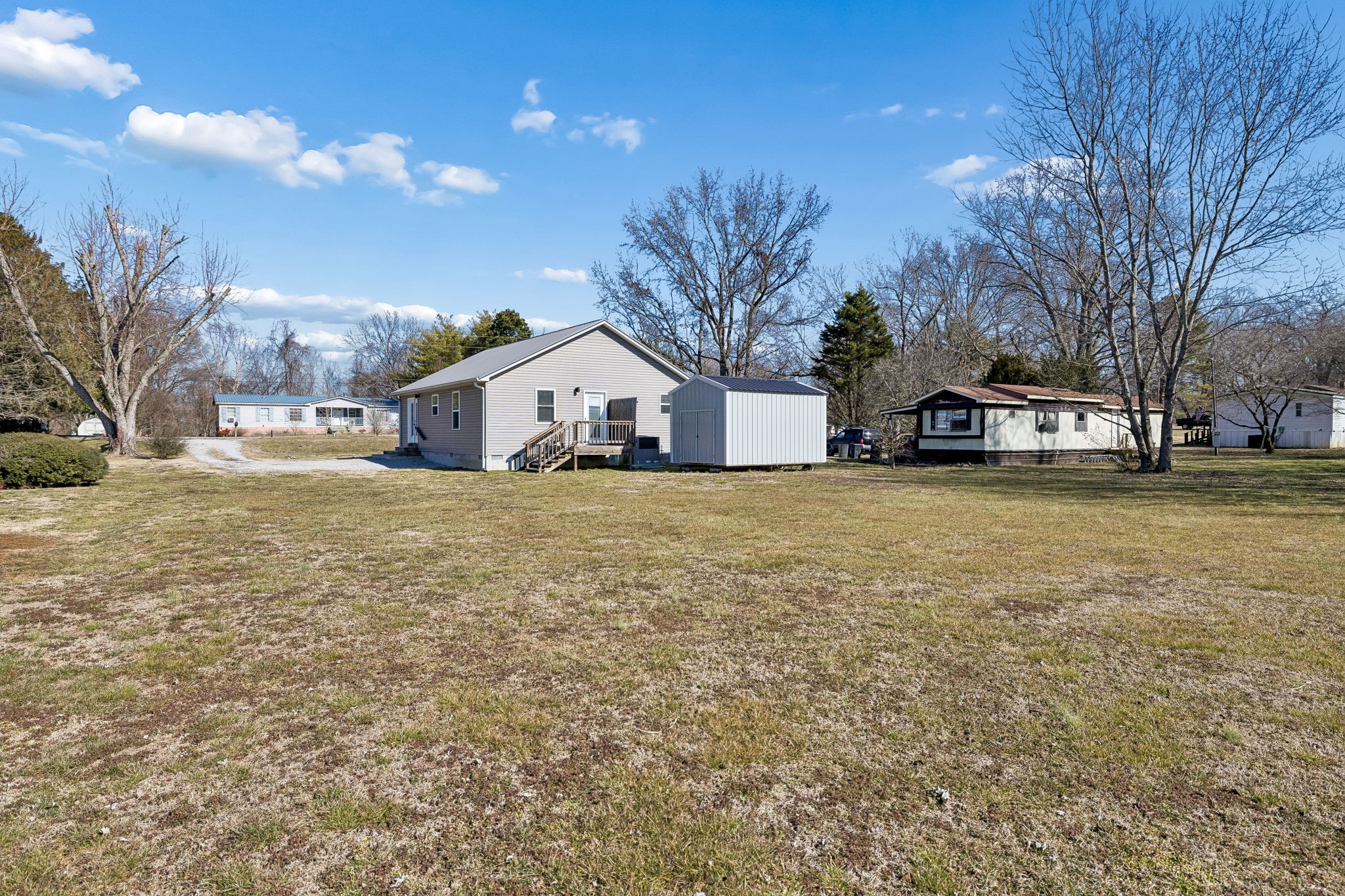 516 Davis Street Cowan, TN 37318 - Photo 24 of 40 a view of a house with a yard