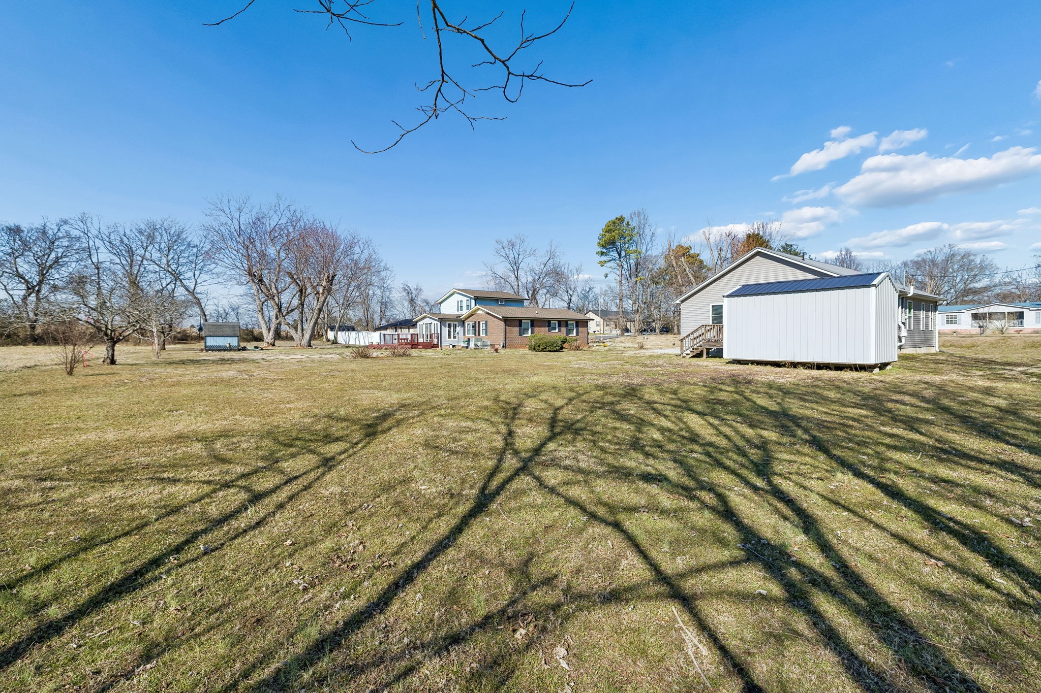 516 Davis Street Cowan, TN 37318 - Photo 25 of 40 a view of a house with a yard