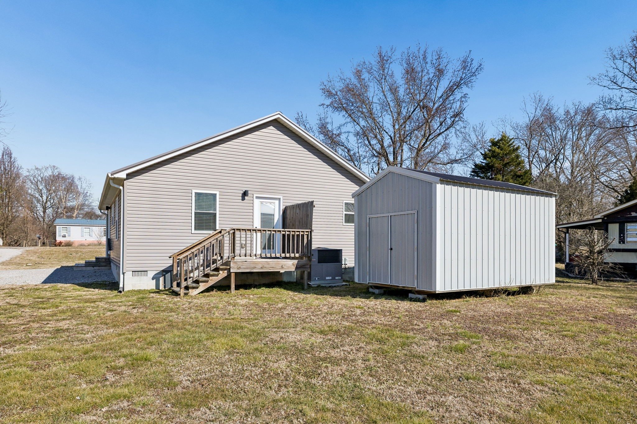 516 Davis Street Cowan, TN 37318 - Photo 28 of 40 a view of a house with a snow in the yard