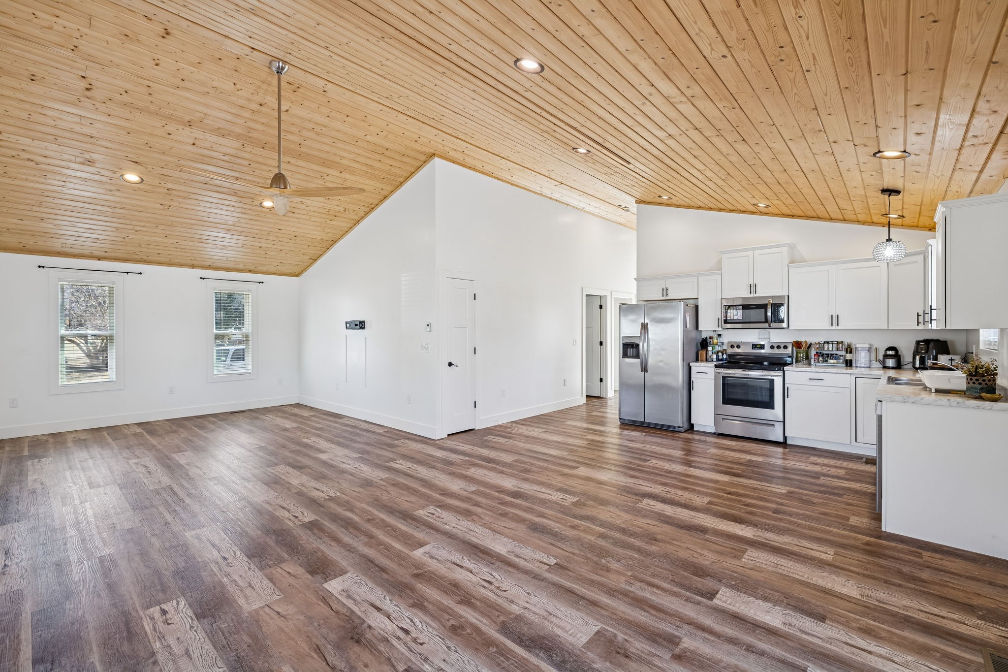 516 Davis Street Cowan, TN 37318 - Photo 8 of 40 a view of kitchen and wooden floor