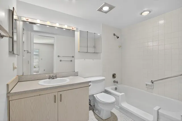 a view of a balcony with wooden floor