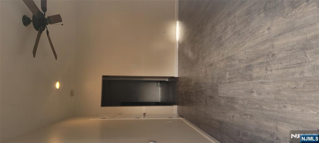 196 Fort Lee Road Teaneck, NJ 07666 - Photo 13 of 13 a view of an empty room with a window