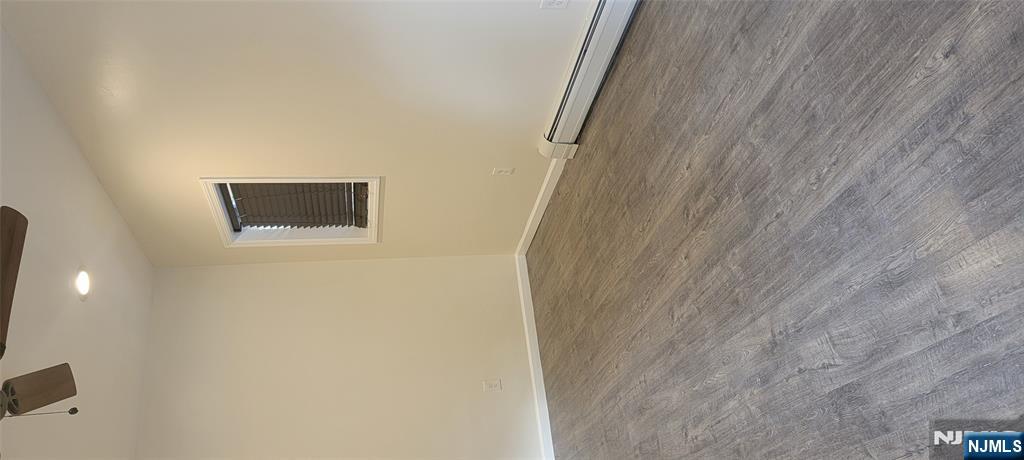 196 Fort Lee Road Teaneck, NJ 07666 - Photo 6 of 13 a view of a livingroom with wooden floor