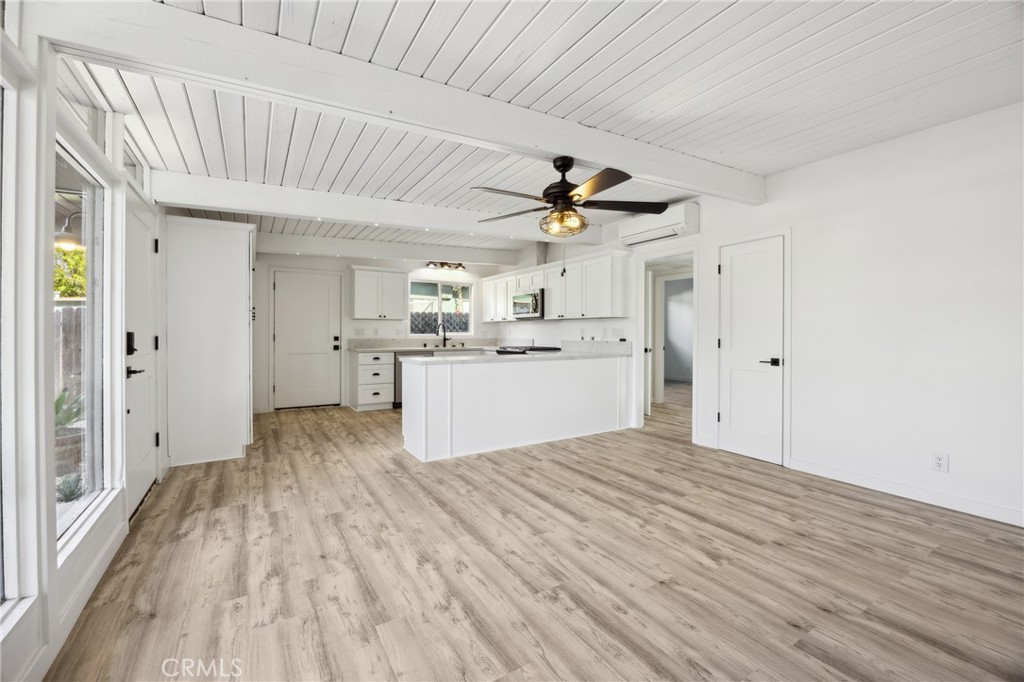 528 Creston Road Paso Robles, CA 93446 - Photo 10 of 46 a view of a kitchen with a sink and wooden floor