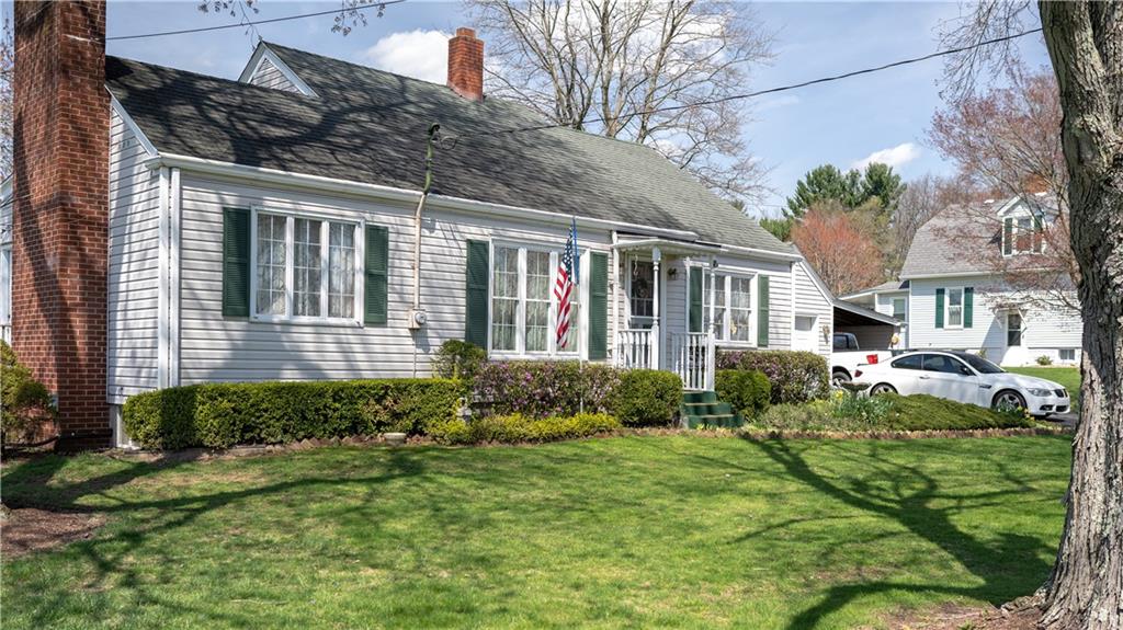 107 North Woodlawn Road Butler, PA 16001 - Photo 2 of 19 a front view of a house with garden