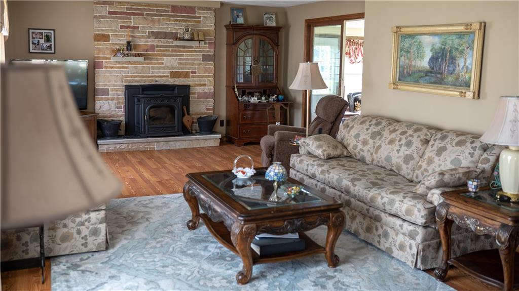 107 North Woodlawn Road Butler, PA 16001 - Photo 8 of 19 a living room with furniture and a fireplace