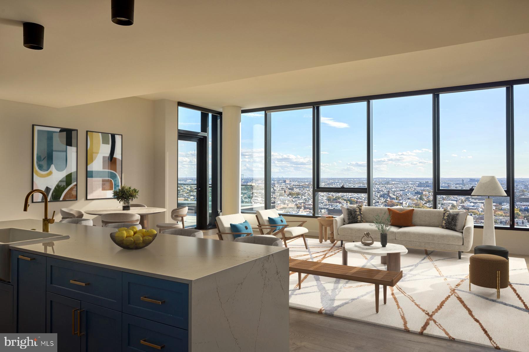a living room with couches and a dining table with garden view