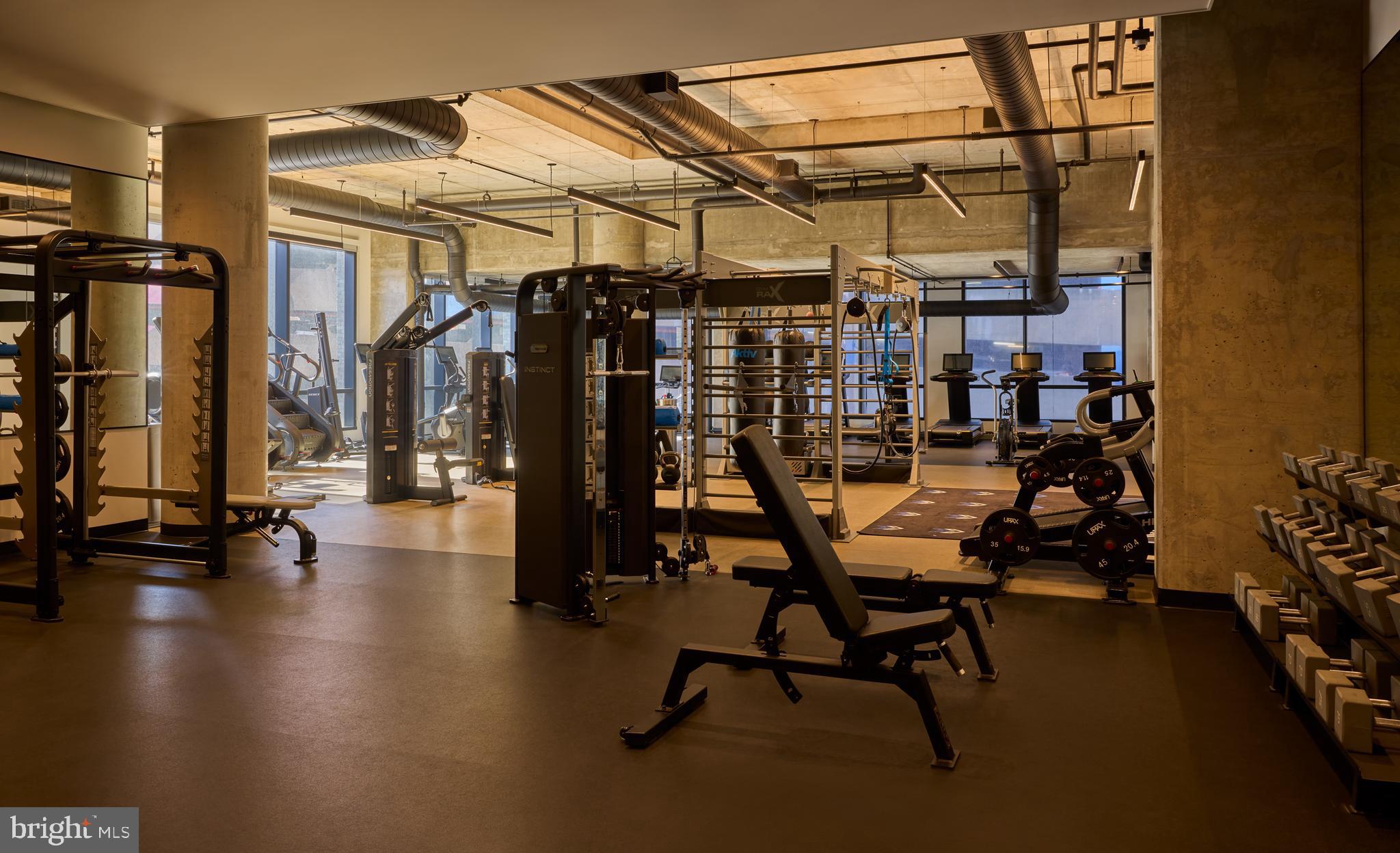 1134 Sansom Street, Unit 1B1706 Philadelphia, PA 19107 - Photo 12 of 33 a view of a room with gym equipment