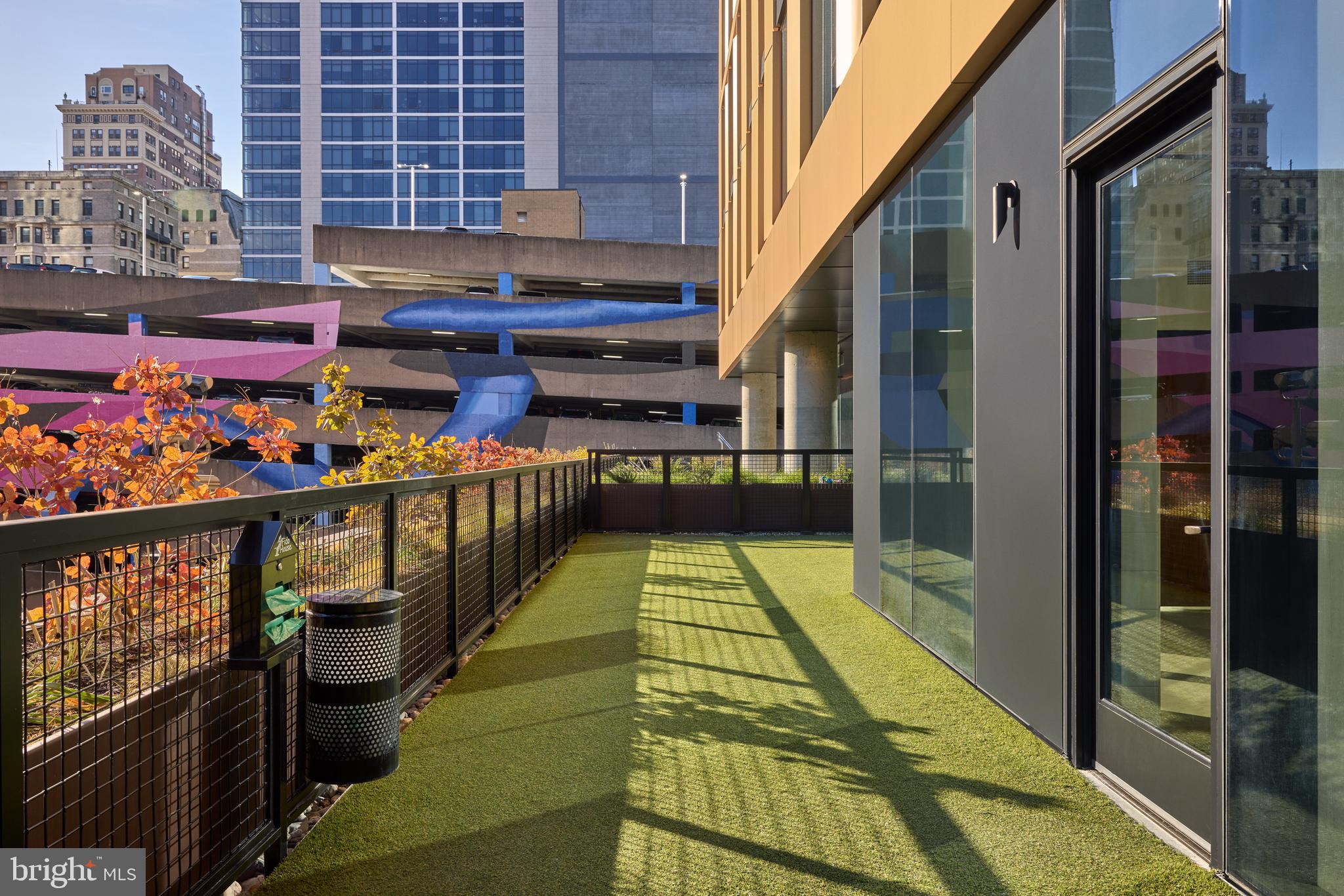 1134 Sansom Street, Unit 1B1706 Philadelphia, PA 19107 - Photo 7 of 33 a view of balcony with wooden floor