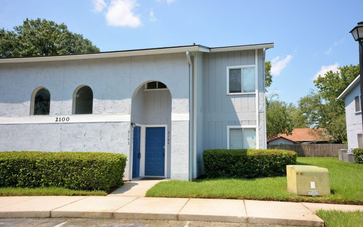 a view of a back yard of the house