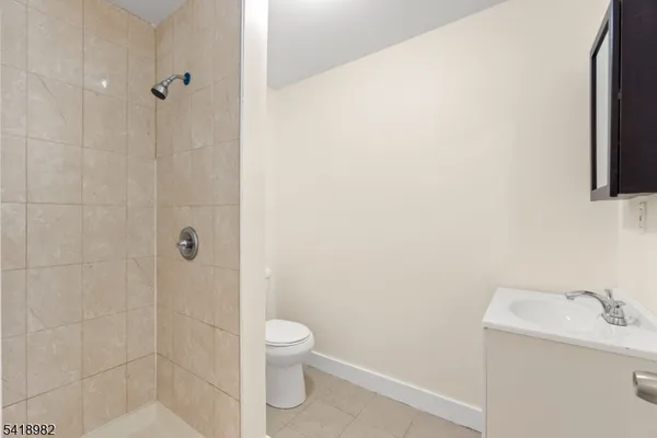 a bathroom with a toilet and a sink