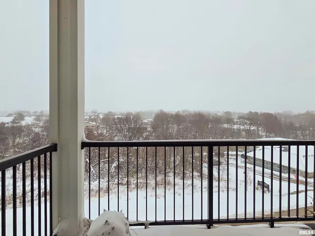 a view of a balcony with an outdoor space