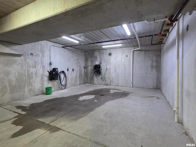 a room with furniture pool table and flat screen tv