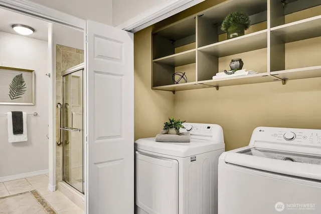 a utility room with dryer and washer