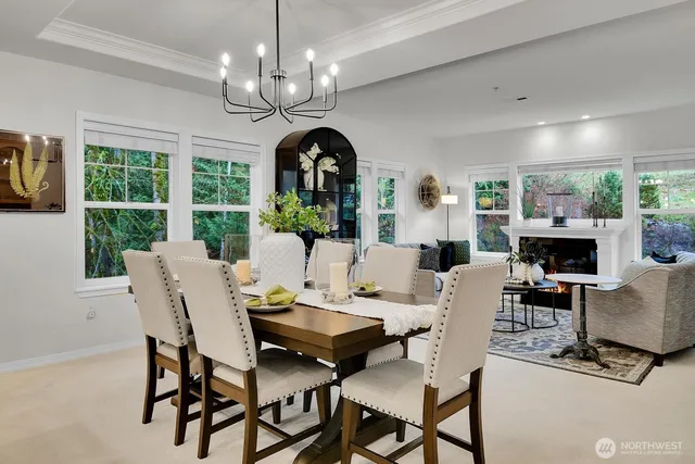a view of a dining room with furniture window and outside view