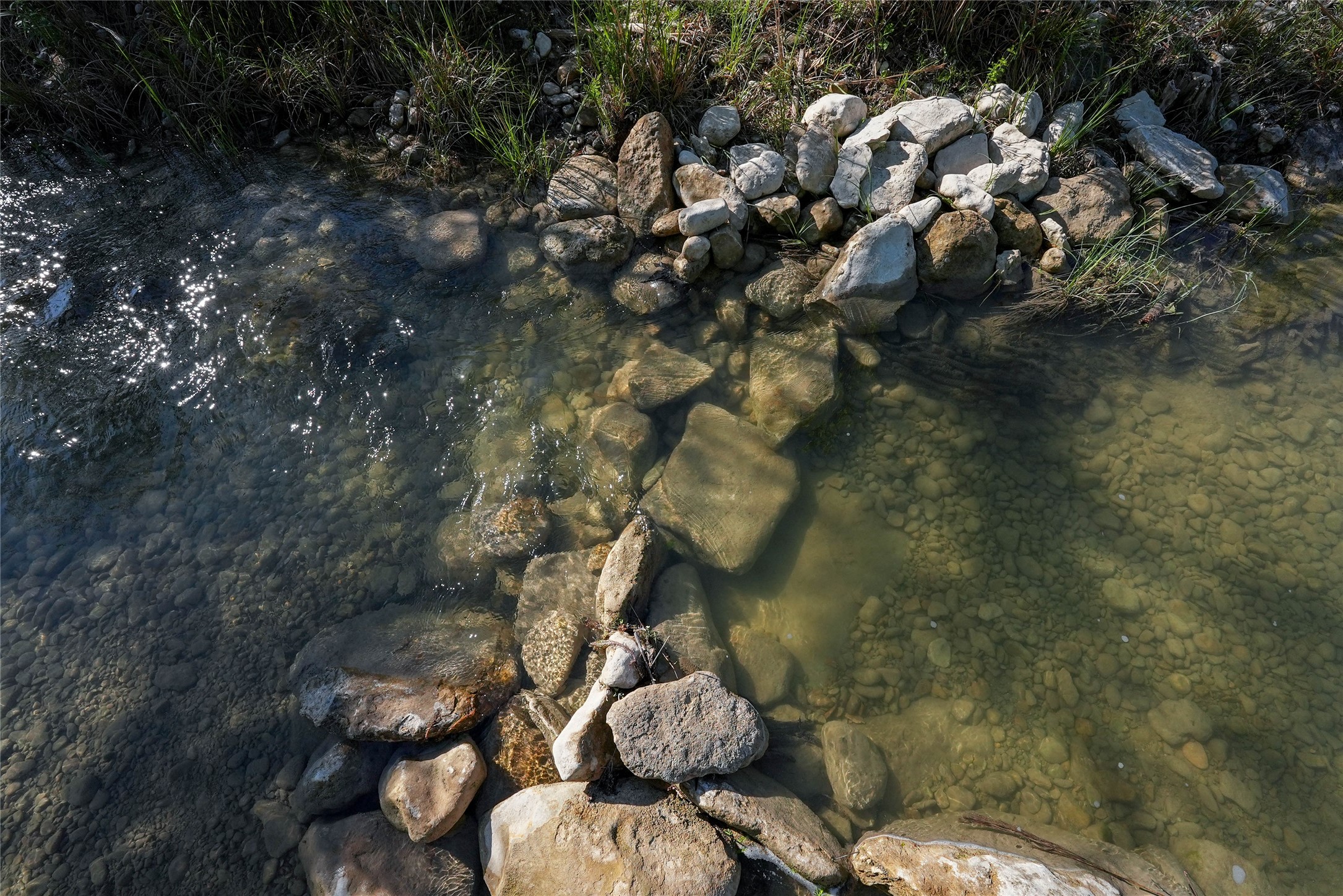 131 Campfire Circle Wimberley, TX 78676 - Photo 35 of 40 a backyard of a house with lots of green space