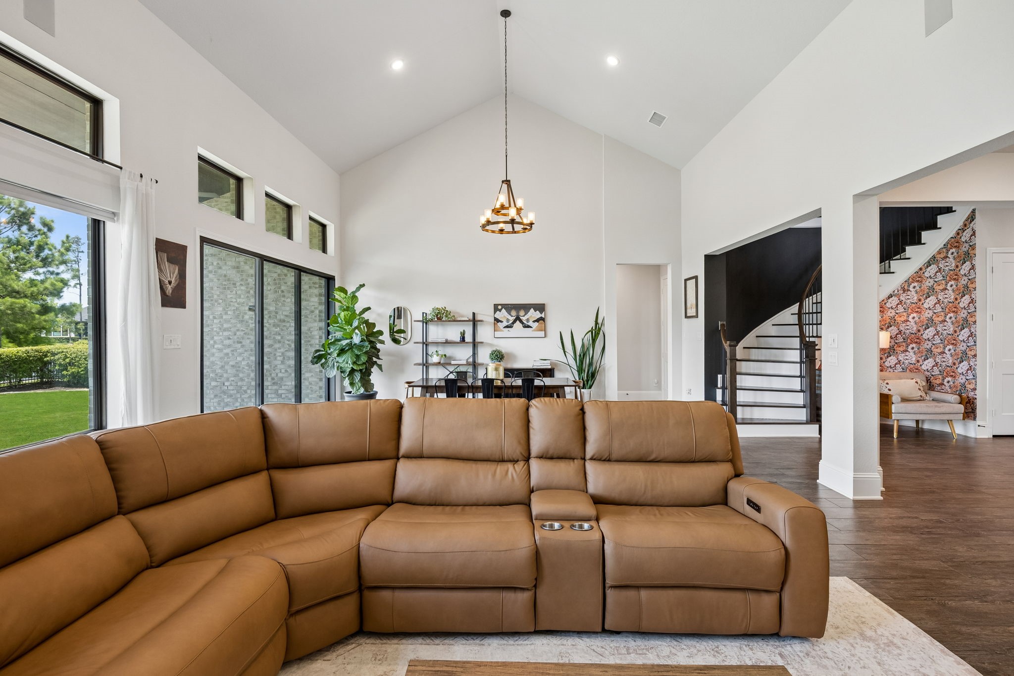 10102 South Goshawk Trail Conroe, TX 77385 - Photo 4 of 46 a living room with furniture ceiling fan and a large window