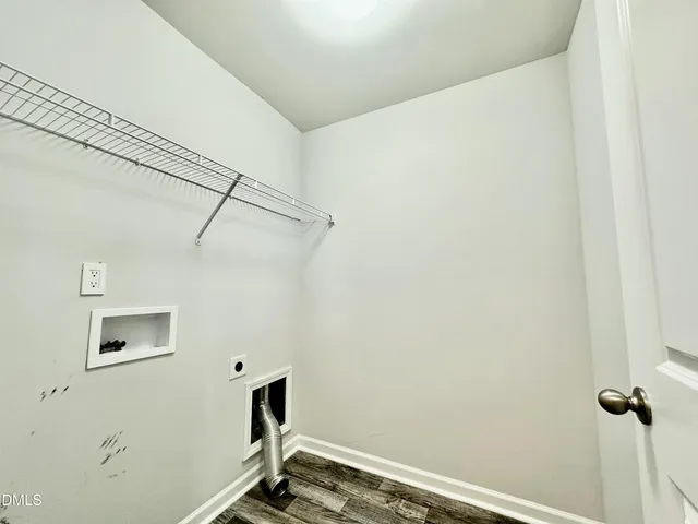 a view of a room with rack on the wall