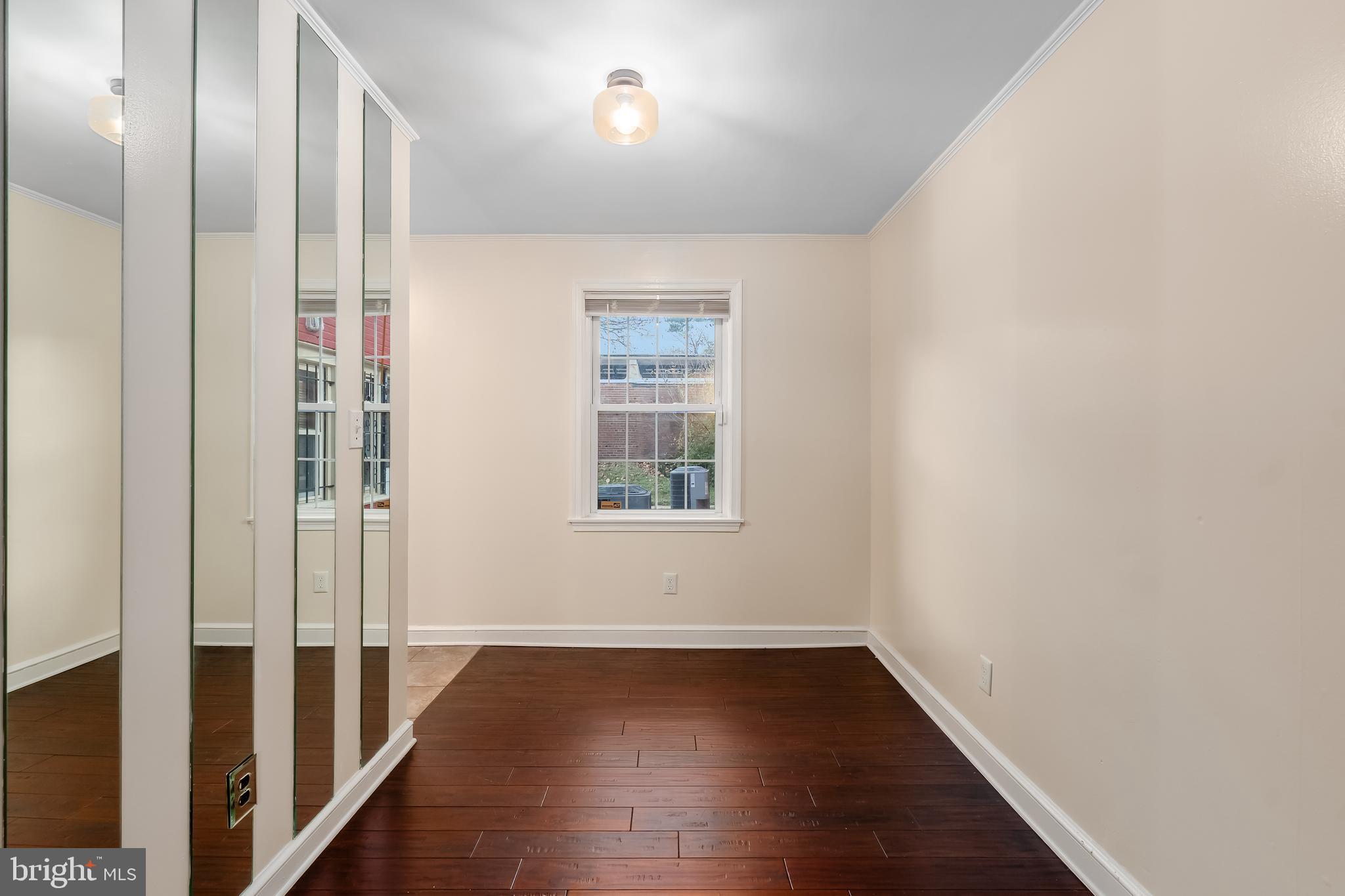 2123 Suitland Terrace Southeast, Unit B Washington, DC 20020 - Photo 8 of 25 a view of hallway with wooden floor