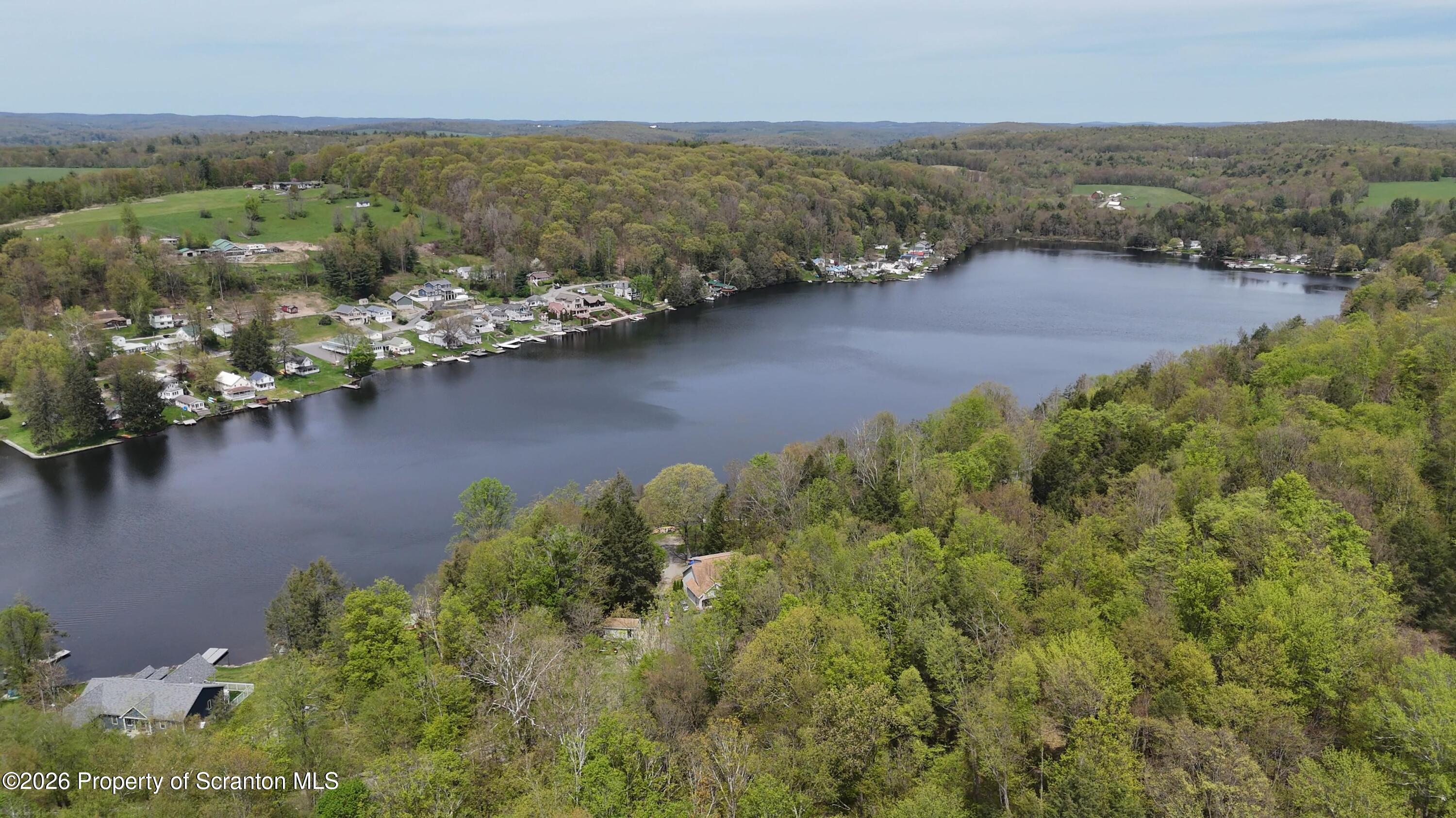 212 Wright Way Factoryville, PA 18419 - Photo 3 of 10 an aerial view of ocean with residential houses with outdoor space