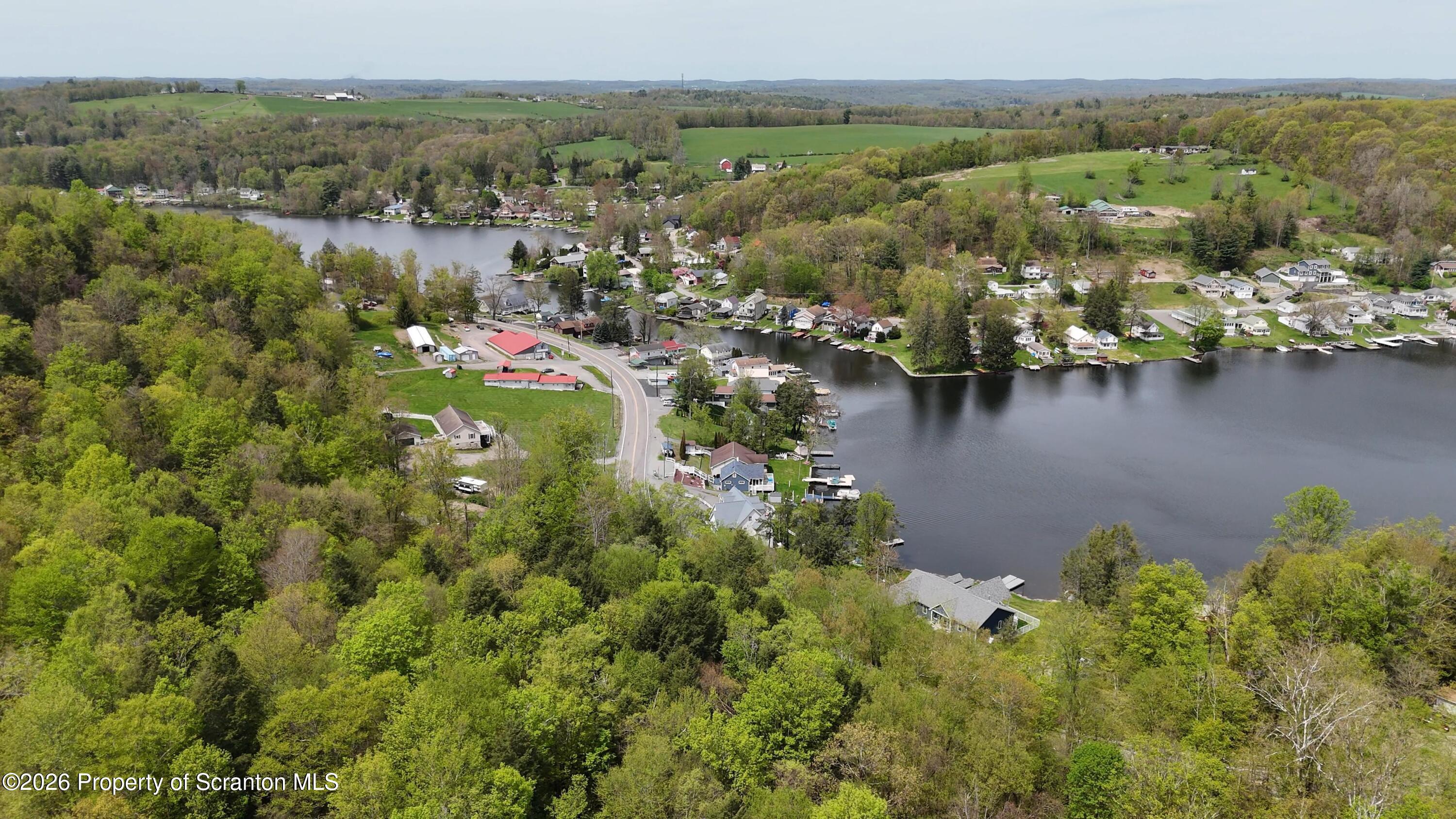 212 Wright Way Factoryville, PA 18419 - Photo 10 of 10 a view of a lake with houses