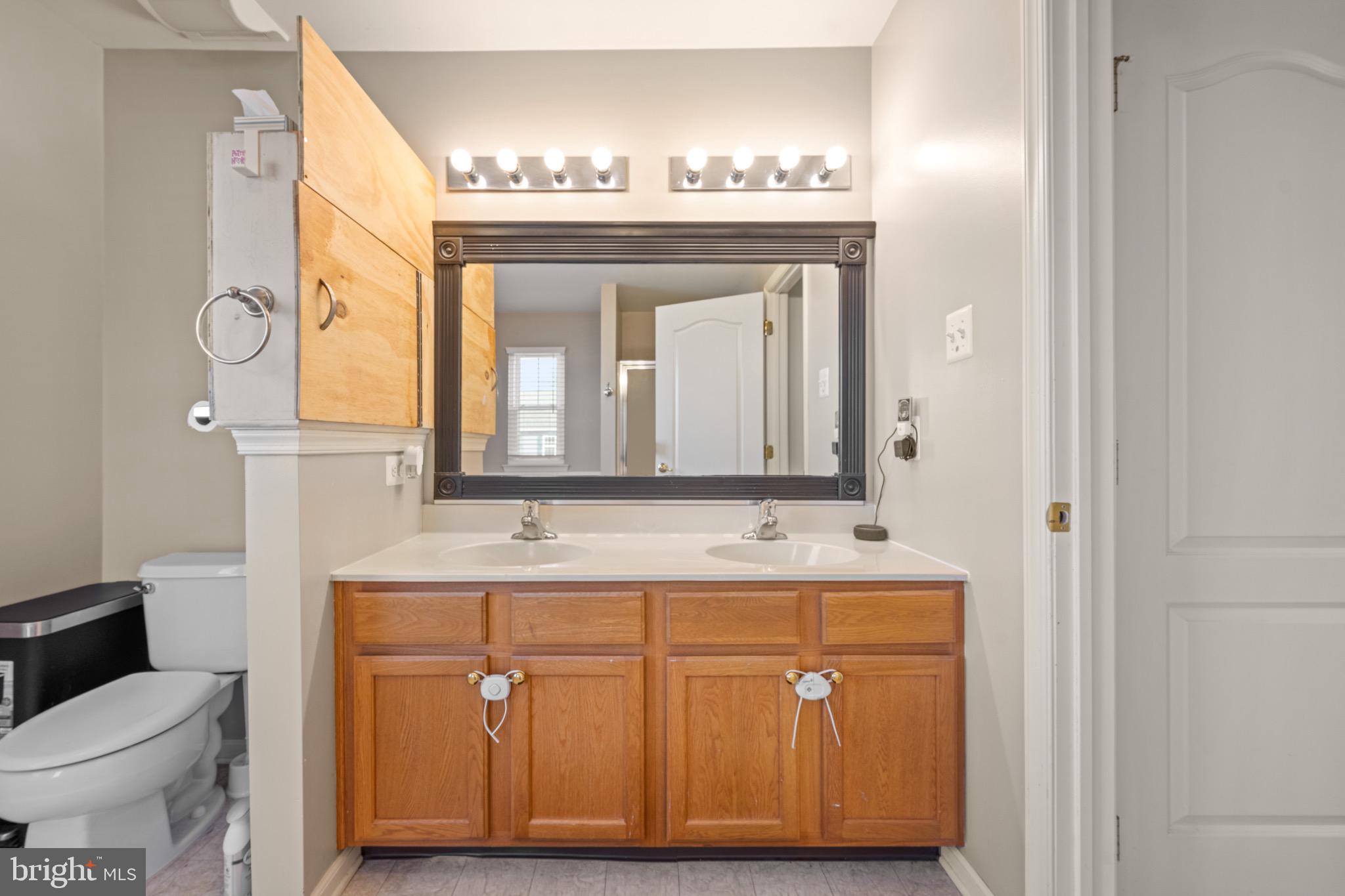 8 Porch Street Clayton, NJ 08312 - Photo 19 of 31 a bathroom with a sink and a mirror