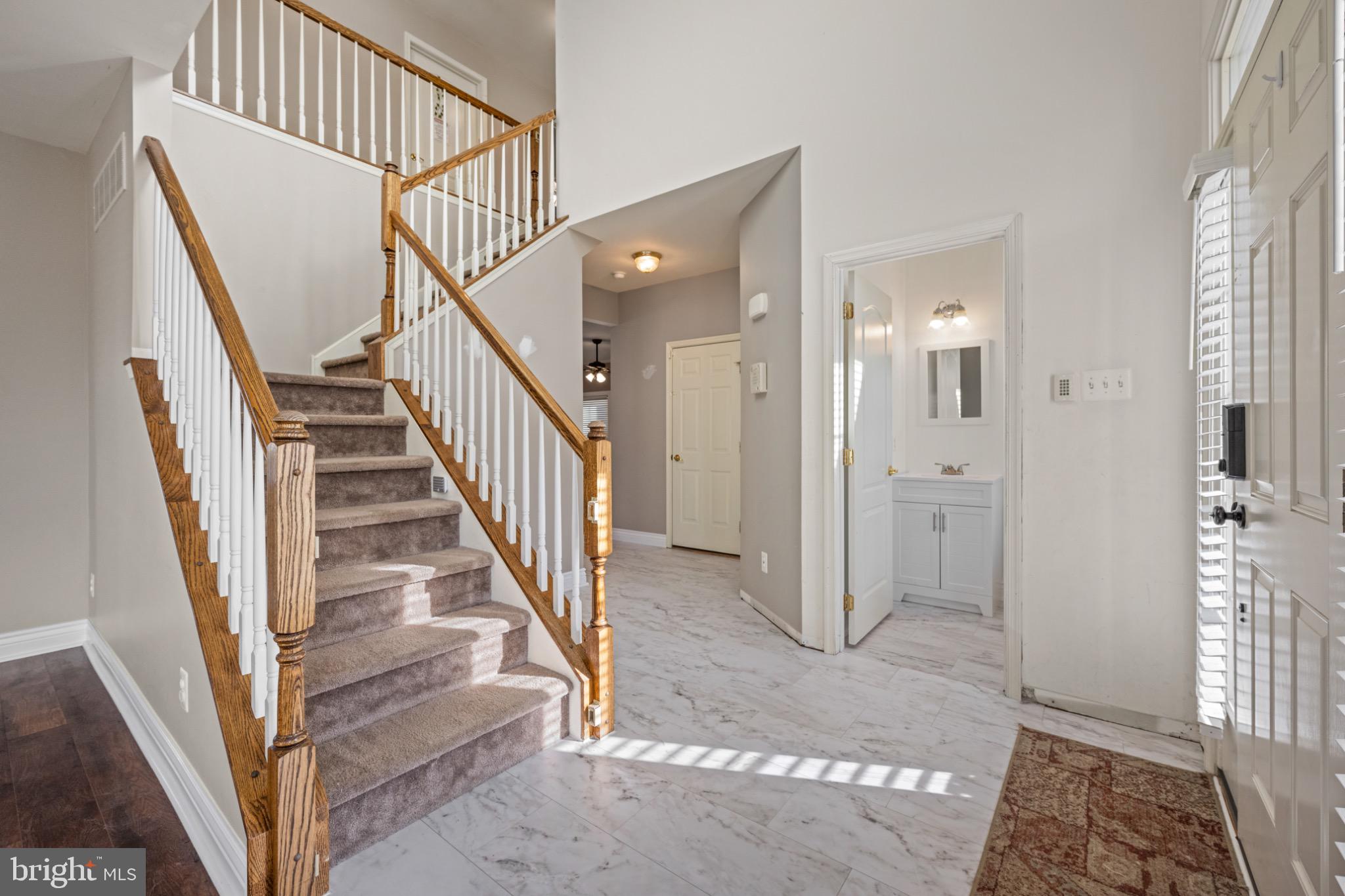 8 Porch Street Clayton, NJ 08312 - Photo 2 of 31 a view of entryway with wooden floor and a front door
