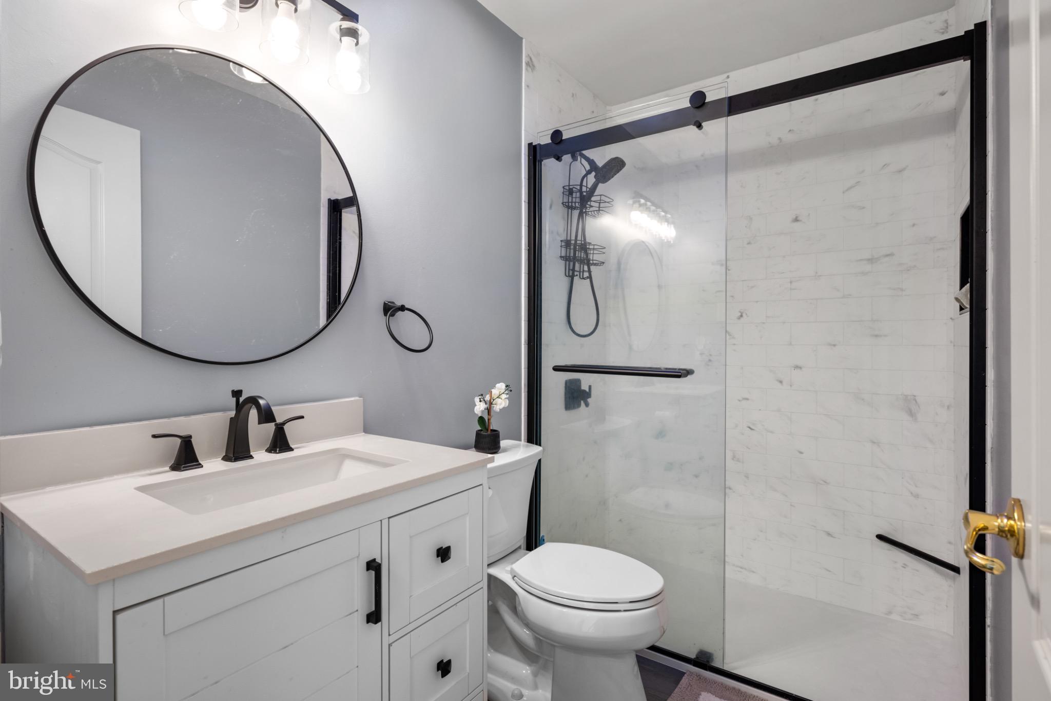 8 Porch Street Clayton, NJ 08312 - Photo 21 of 31 a bathroom with a sink toilet and shower