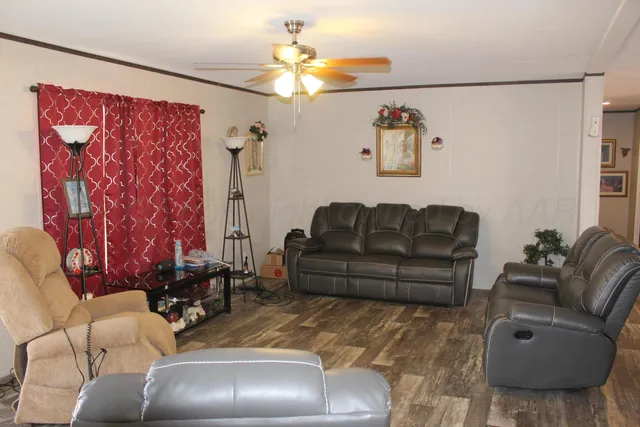a living room with furniture and a couch