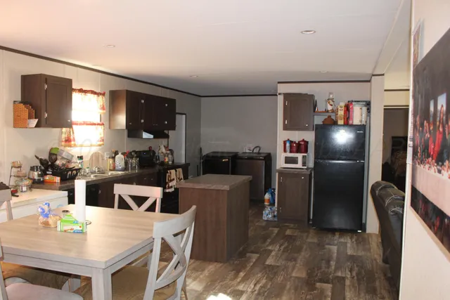 a view of kitchen and living room