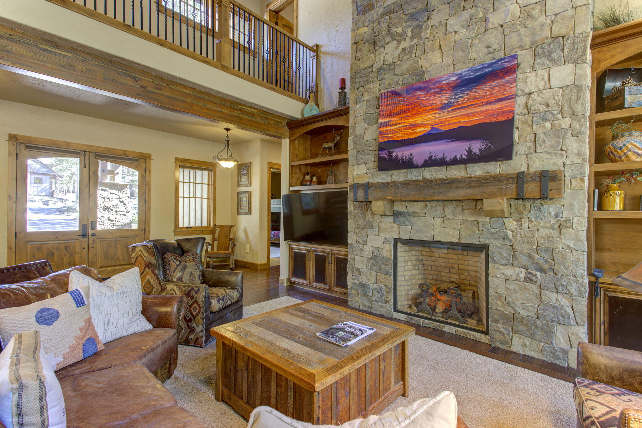 56184 Sable Rock Loop Bend, OR 97707 - Photo 14 of 72 Custom wood milled cabinets surround the fireplace