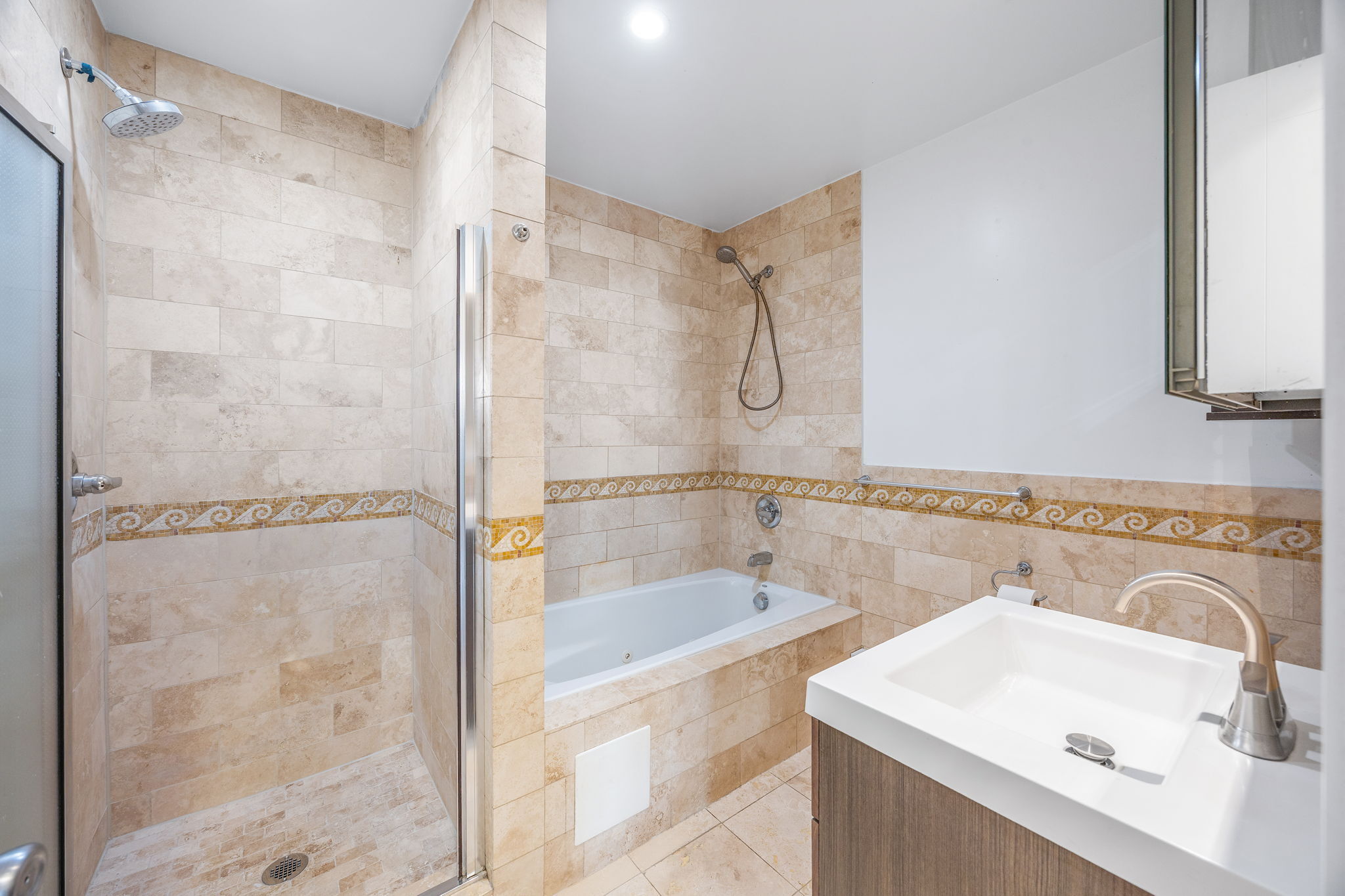 175 12th Street, Unit 2B Brooklyn, NY 11215 - Photo 17 of 20 a bathroom with a sink vanity mirror and shower
